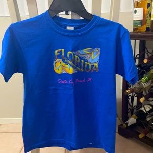 Kids t-shirt size medium, excellent condition never worn